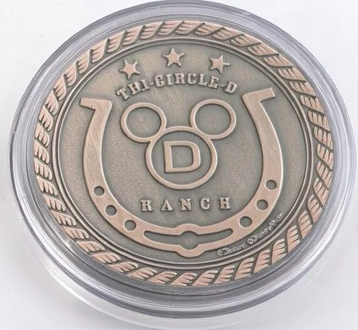Woody & Jessie on Bullseye Disney medallion coin, back