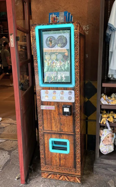 The medallion machine at Mombasa Marketplace / Zuri's Sweets Shop