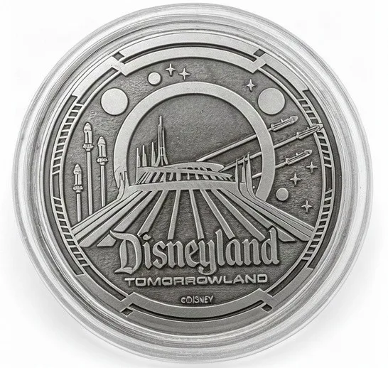 The Disneyland Tomorrowland back of a Disney medallion coin (Buzz Lightyear & Aliens)