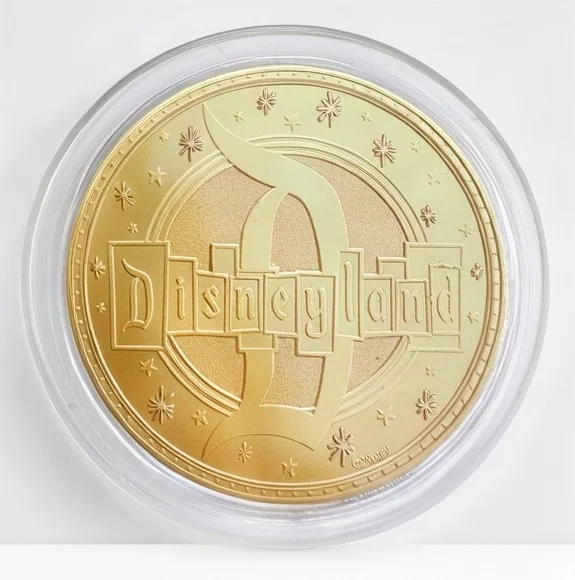 The Disneyland back of a Disney medallion coin (Mickey Mouse)