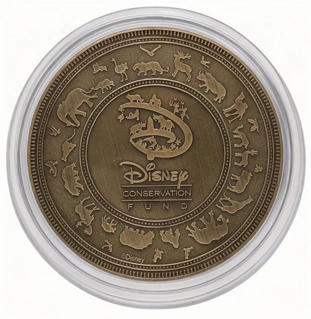 The Disney Conservation Fund back of a Disney medallion coin (Simba & Mufasa)