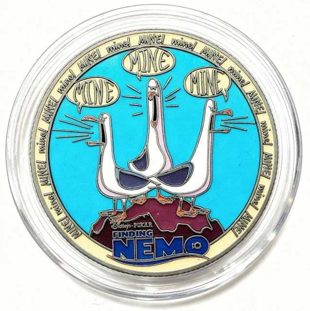 Seagulls 'Mine!' Disney medallion coin, front (The Seas with Nemo & Friends Pavilion, EPCOT)