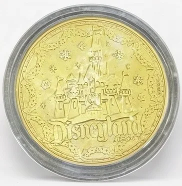 Mickey Reviewing the Nice List Disney medallion coin, Disneyland Resort at Christmas back (World of Disney (East), Downtown Disney District)