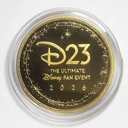 The D23 2026 back of a Disney medallion coin (Dumbo 85 Years)