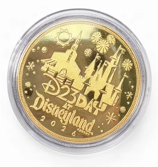 it's a small world 60 Years Disney medallion coin, D23 Day at Disneyland 2026 back (D23 Day event machine, D23 Day at Disneyland 2026)
